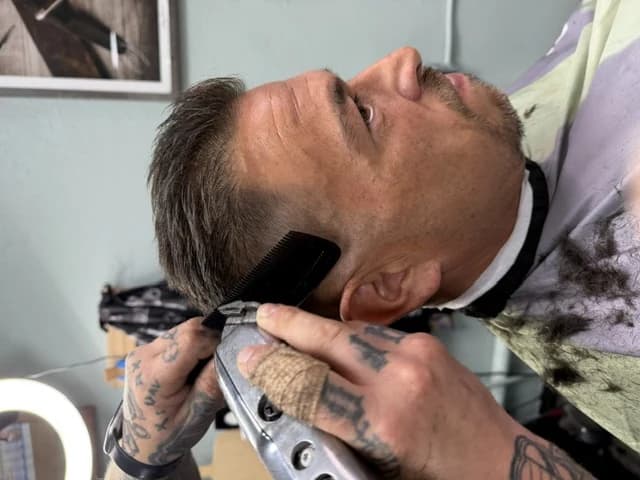A fade taken down with clipper and comb on a client at Barber Shack in Bellingham.