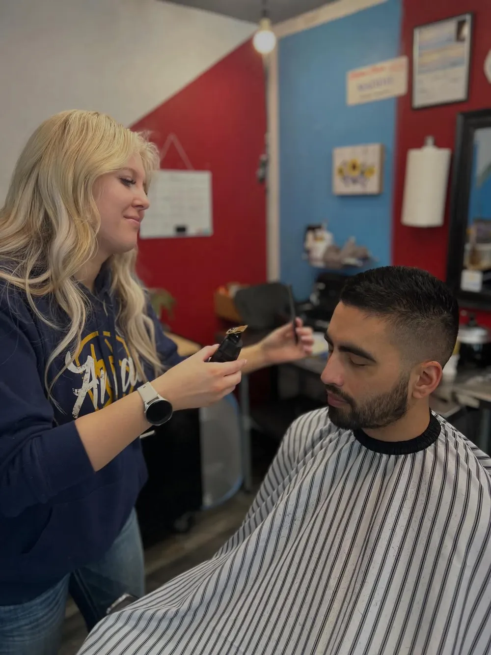 A barber working a clean fade on a client at Barber Shack in Bellingham.