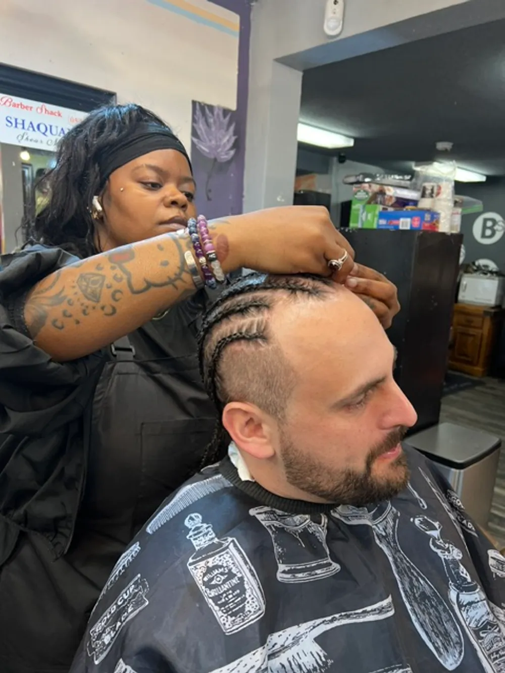 A sharp fade finished at Barber Shack.