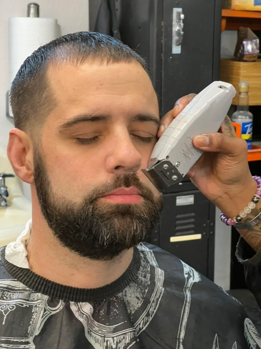 A sharp neckline and edge line-up at Barber Shack.