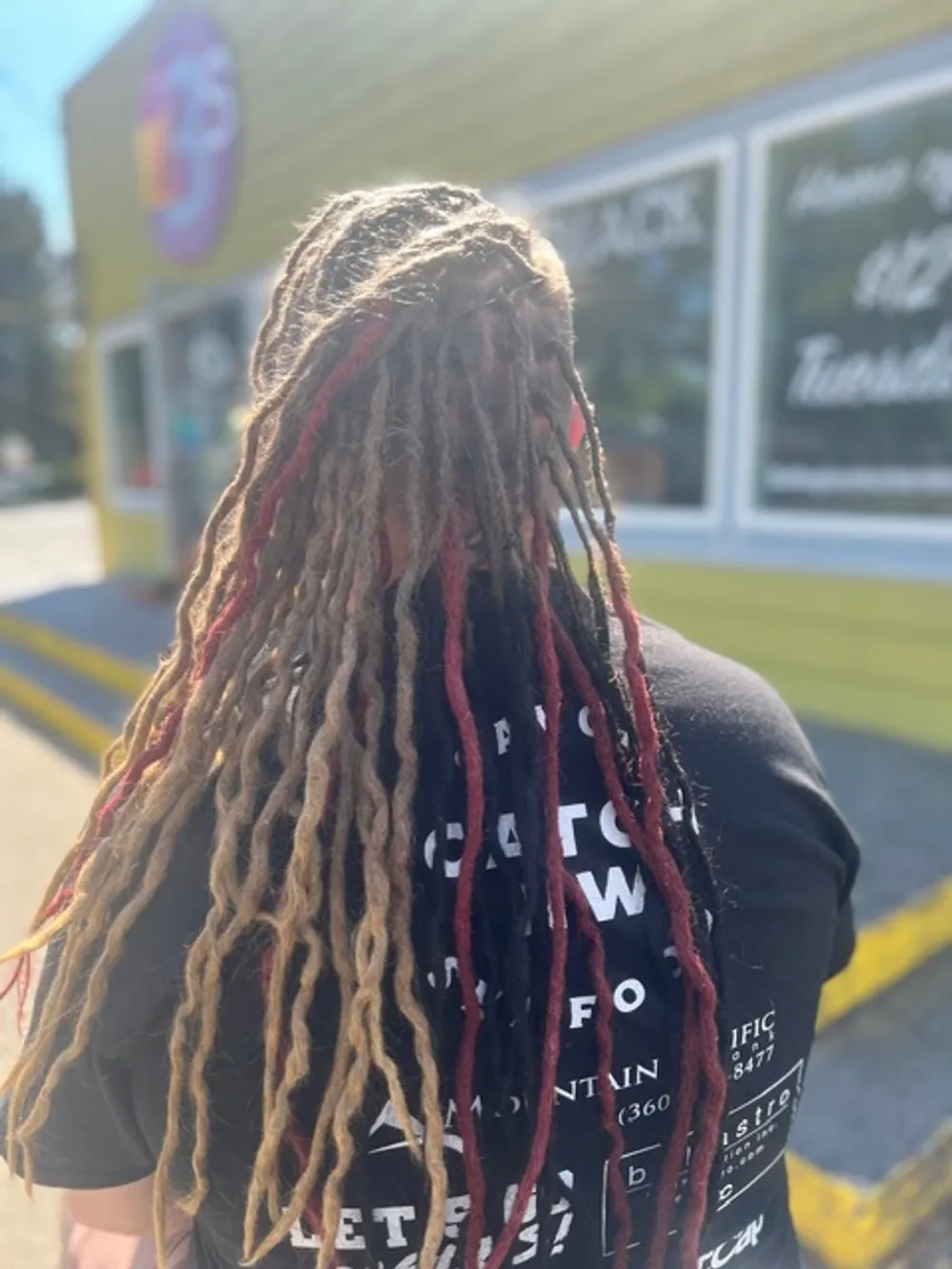 Healthy, maintained locs — textured hair care at Barber Shack.