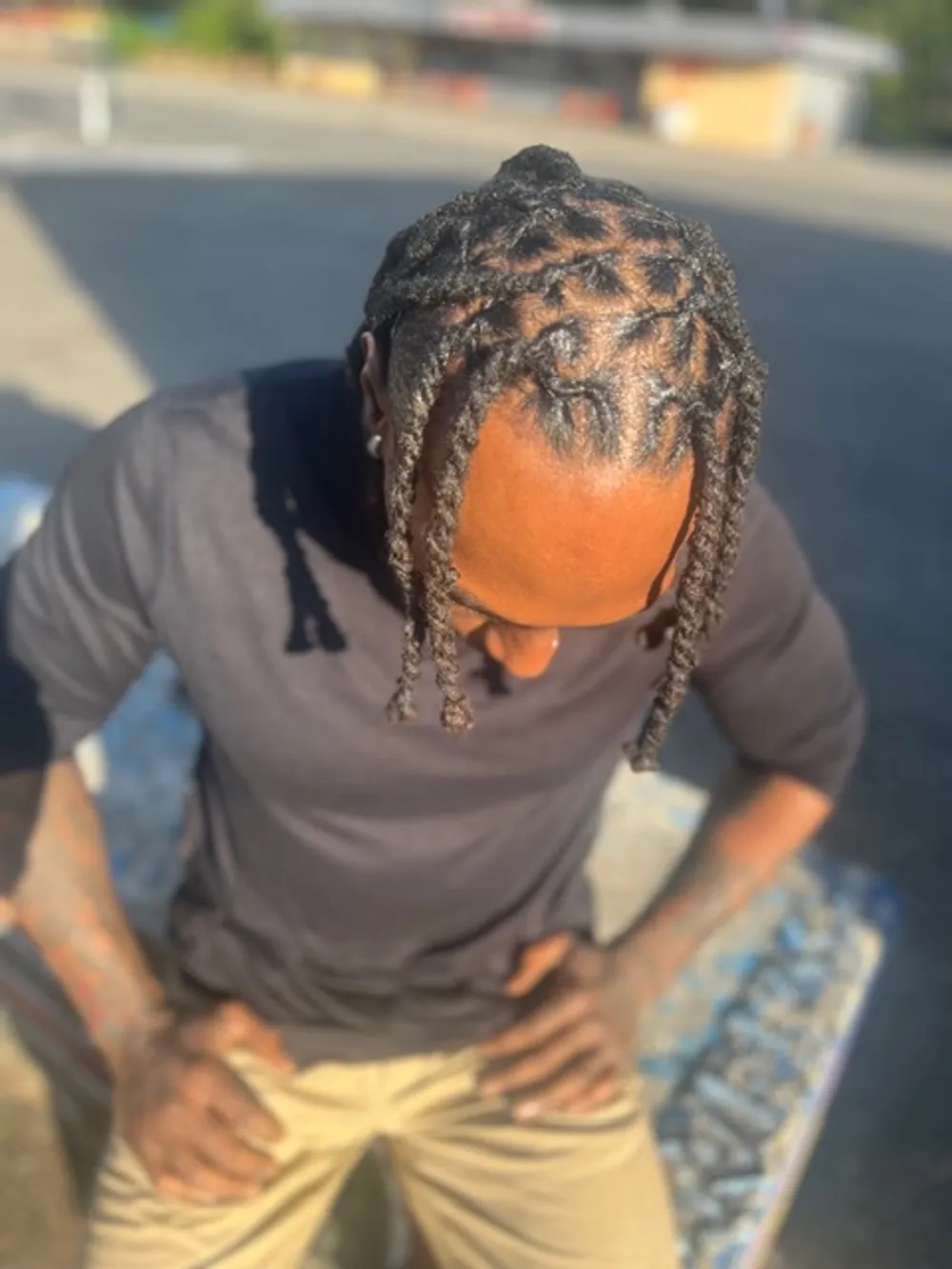 Long, healthy locs cared for at Barber Shack.